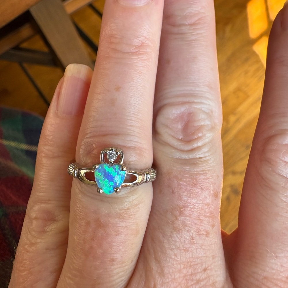 Elegant Sterling Silver Opal Claddagh Ring
